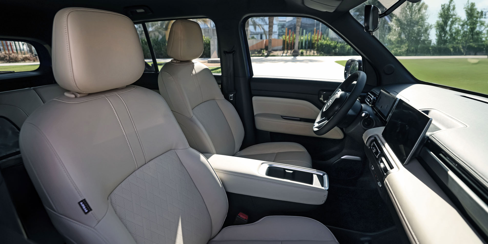 Asientos delanteros del Chevrolet Spark EUV color beige